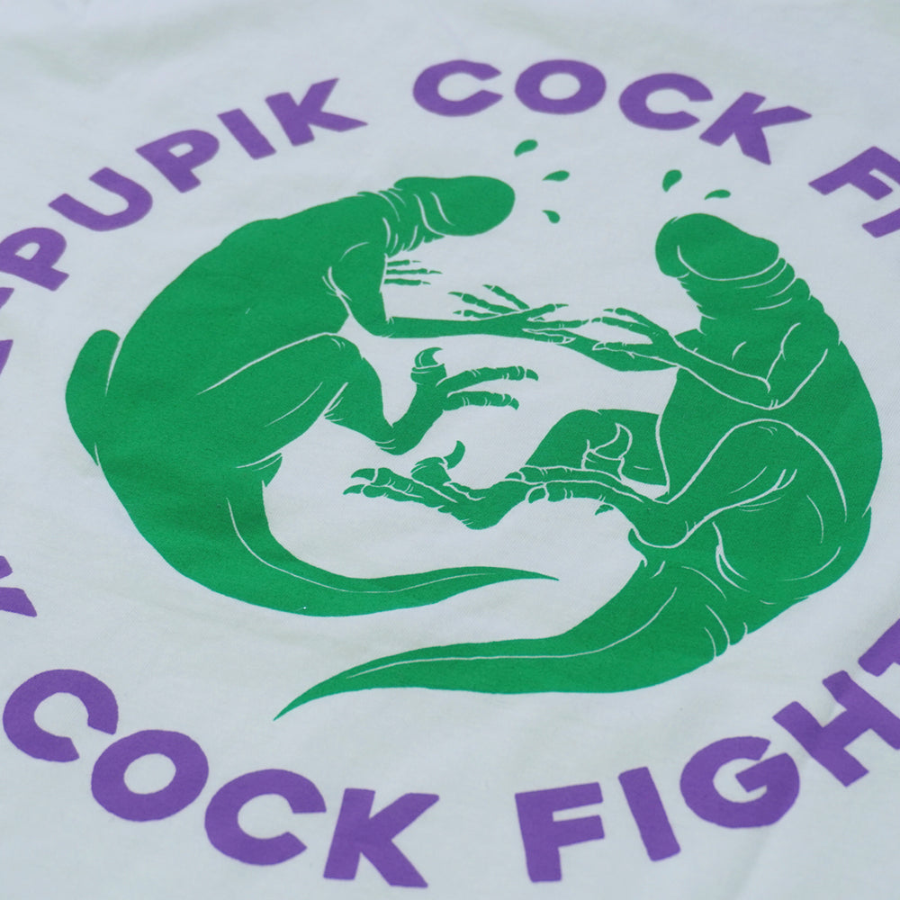 Close-up of the large Pupik Cockfights back print showing two fighting creatures in high contrast inside a circular border with surrounding text