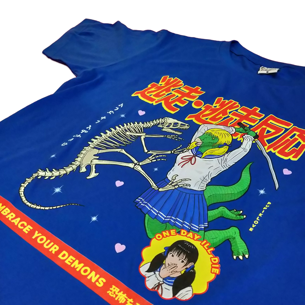 Close-up of the screen-printed front graphic on the royal blue shirt