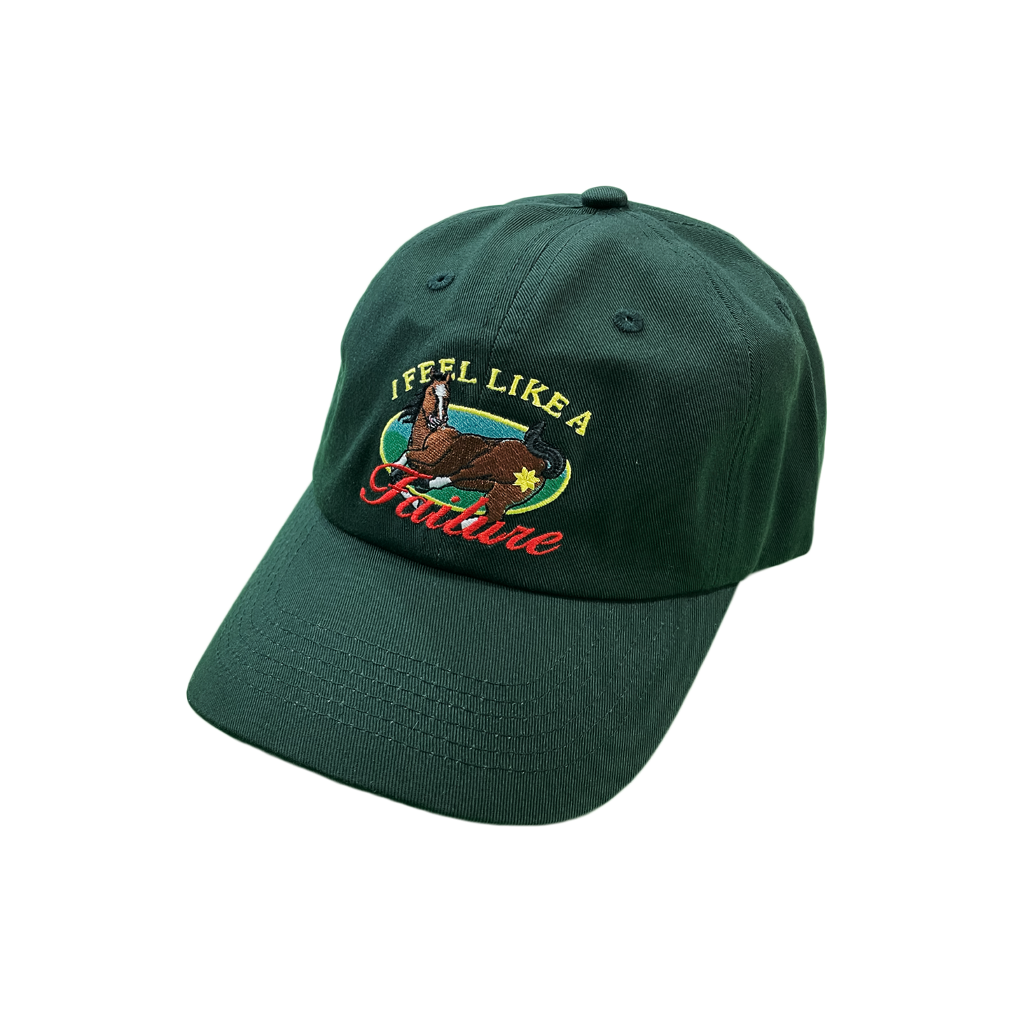 Green cap with embroidered design and text on a white background