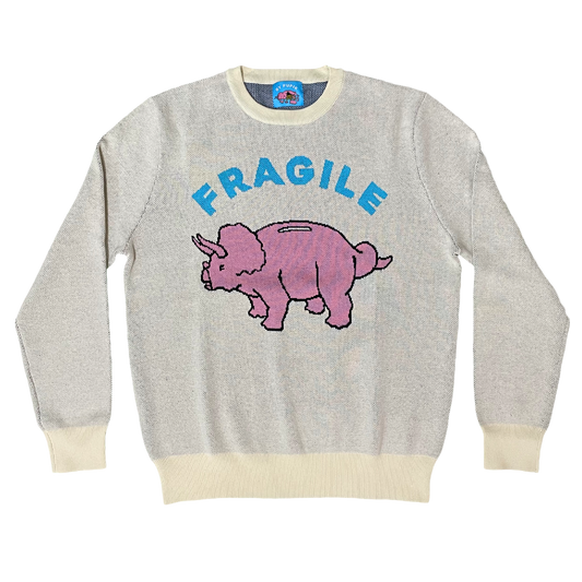 Gray sweater with pink triceratops and 'FRAGILE' text on a white background