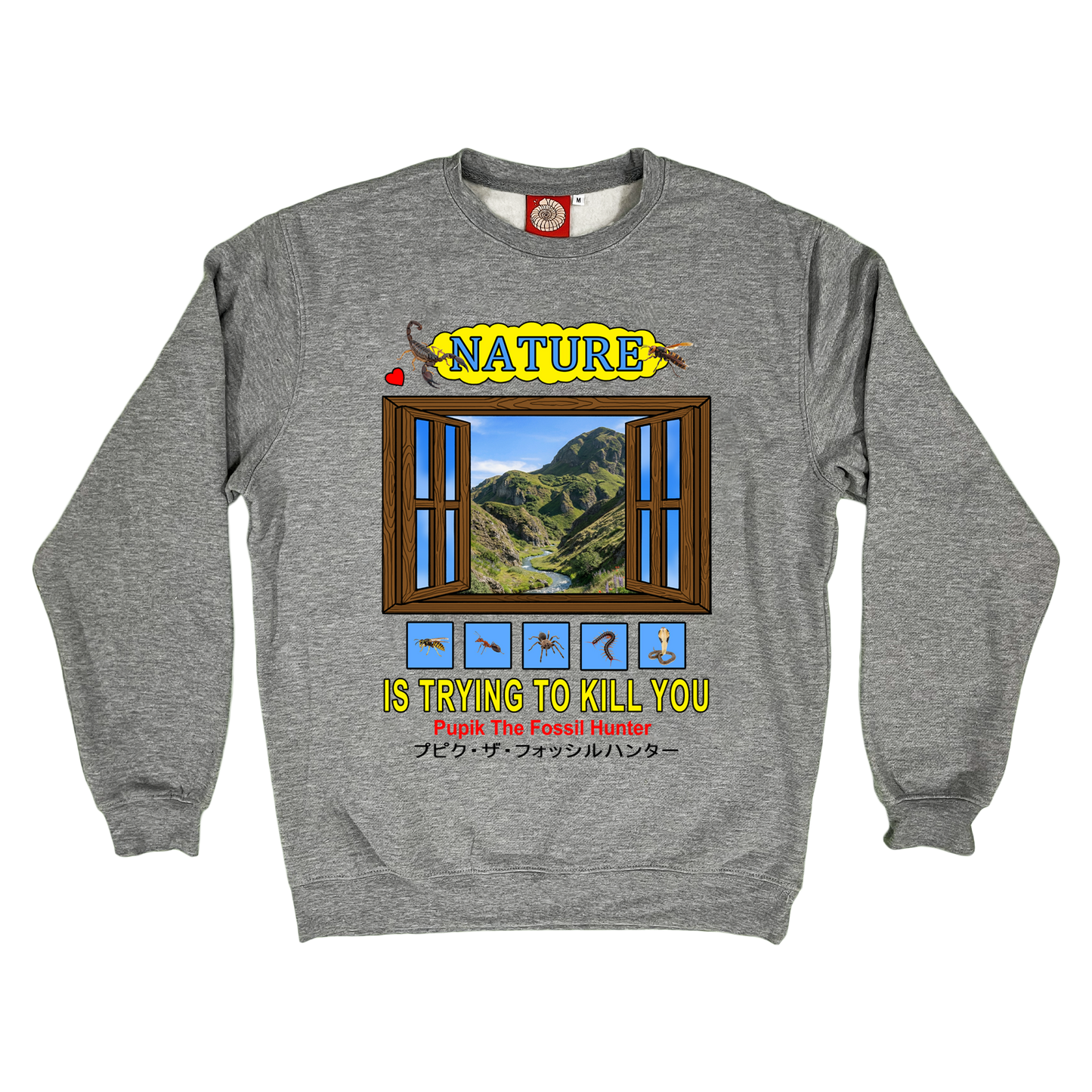 Pupik Nature Is Trying to Kill You crewneck in heather grey with window landscape graphic and yellow title text.
