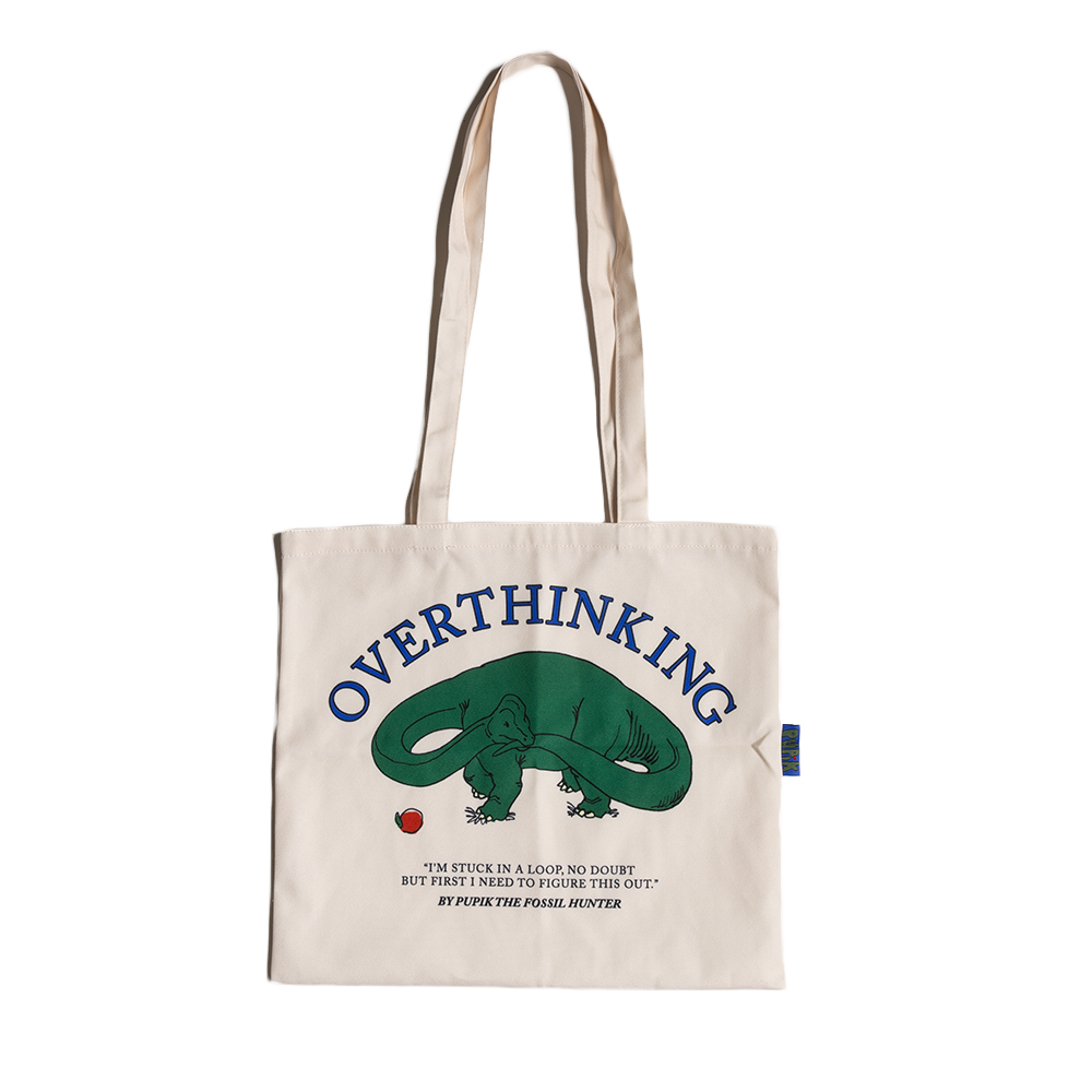 Pupik beige tote bag with an Overthinking Pupik graphic printed on the front.