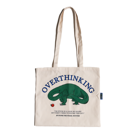 Pupik beige tote bag with an Overthinking Pupik graphic printed on the front.