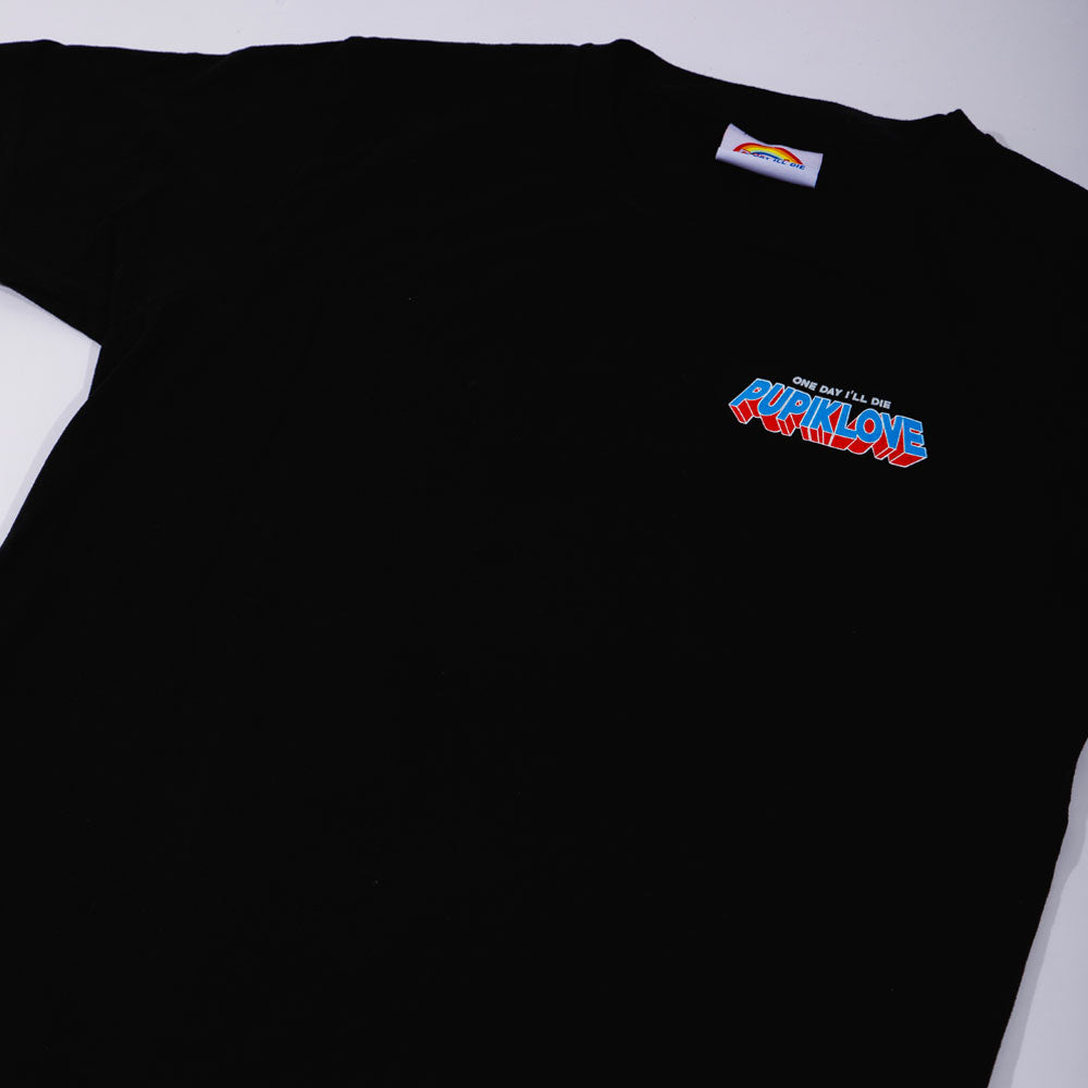 Close-up of the Pupik Love front emblem print on black cotton fabric.