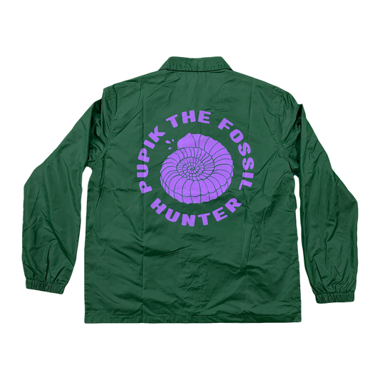 Back view of the Pupik green windbreaker with a large purple Pupik graphic and “Pupik The Fossil Hunter” text printed across the back.