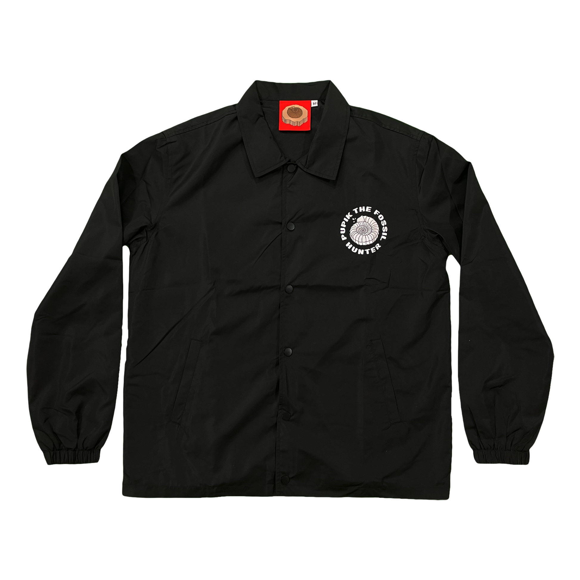 Pupik black windbreaker with a small white Pupik graphic printed on the left chest.